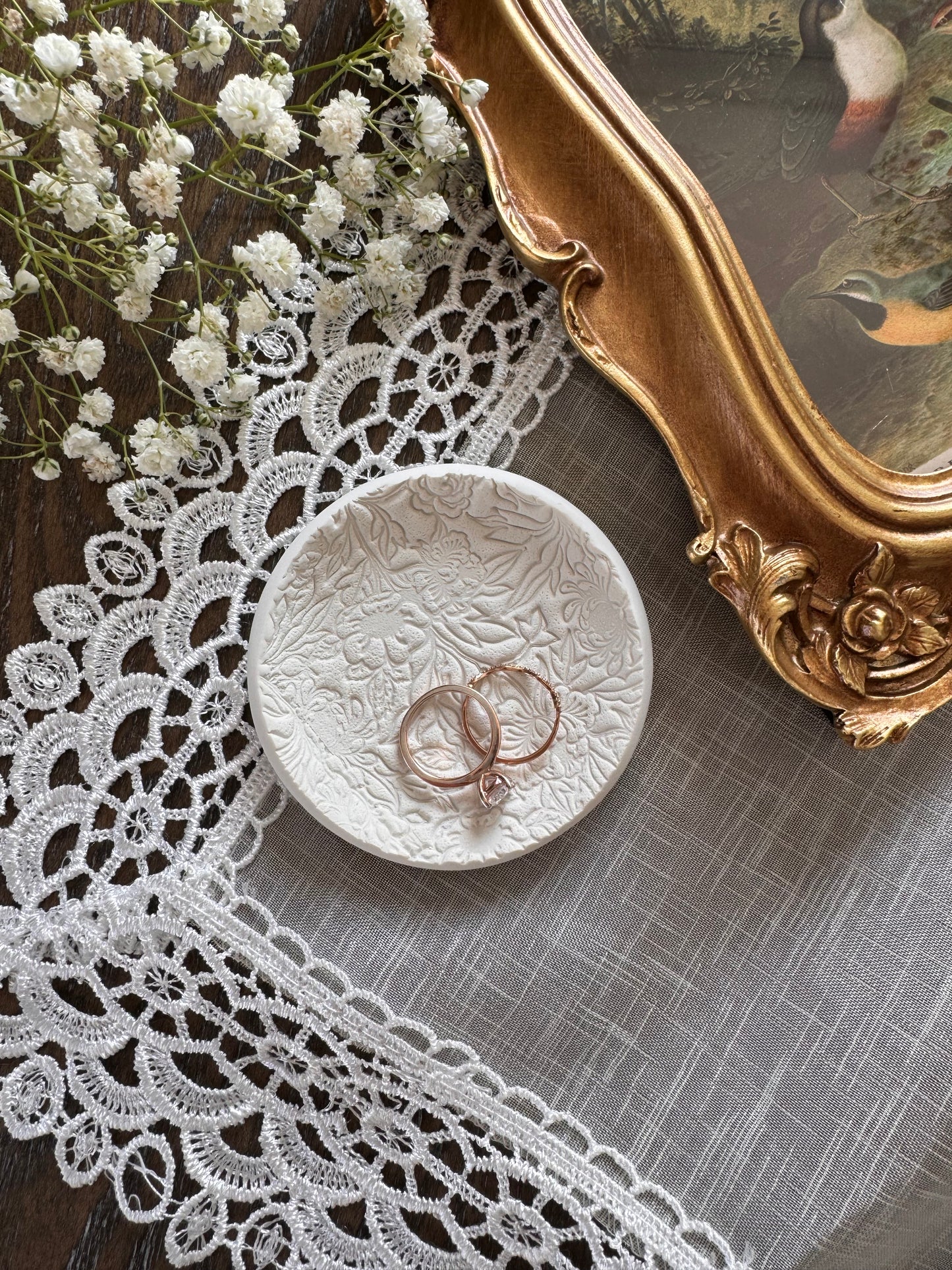 white clay floral pattern textured ring dish for wedding couples