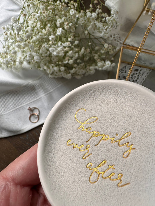 custom ring dish with happily ever after in gold embossed on it for wedding couples