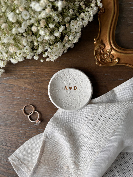 nature textured design ring dish made of white clay with initials in center