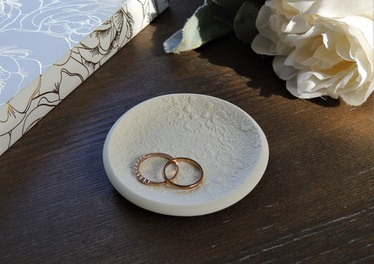 white ring dish with sunflower print