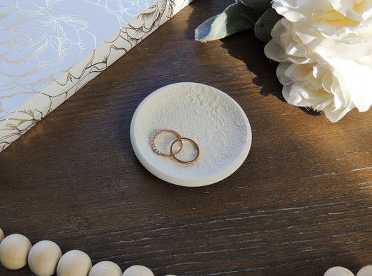 white ring dish with sunflower print