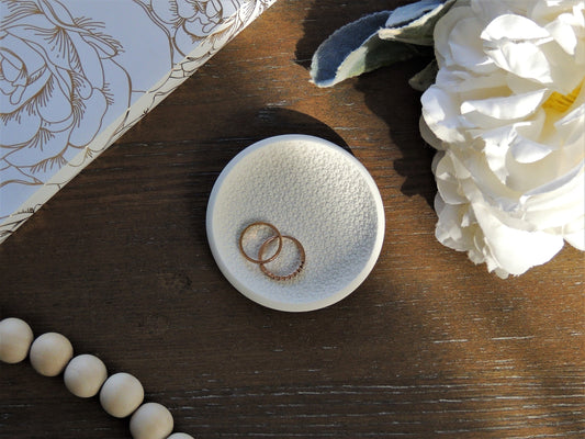 white ring dish with textured floral design, perfect for photography prop, flat lay kits