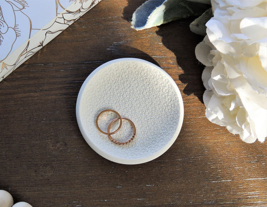 white ring dish with textured floral design, perfect for photography prop, flat lay kits